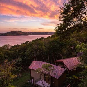 eSIM Costa Rica brown wooden house near trees