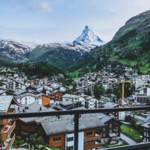 aerial photography of houses near mountains at daytime