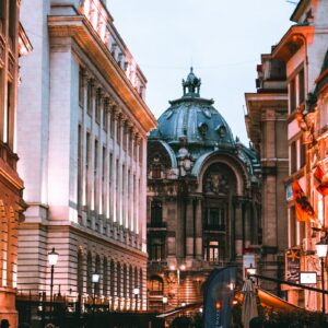 people walking beside buildings