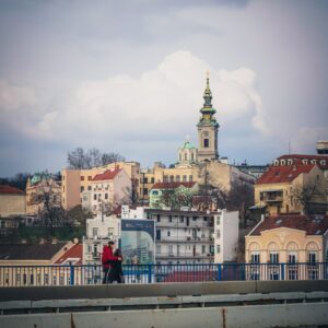 brown and green concrete building under cloudy sky during daytime